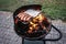 Grilled sausage on metal tray, barbecue