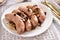 Grilled sausage with onion and mushrooms as traditional Easter dish in Poland