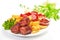 Grilled sausages with potatoes fries and sweet bulgarian peppers and red sauce ketchup