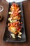Grilled scallops with salsa lemon sweet and sour sauce