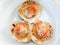 Grilled scallops shell with butter and cheese.