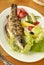 Grilled sea bass with fresh vegetables