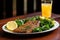 grilled seitan steak with lemon wedges and salad