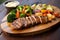 grilled seitan steak served with a side of vegetables