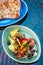 Grilled shrimp salad with mango, tomato, balsamic and pita bread