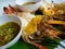Grilled shrimp with Seafood sauce,On plate White color secondary Restaurant food With banana leaves,In Restaurant Thailand