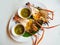 Grilled shrimp with Seafood sauce,On plate White color secondary Restaurant food With banana leaves,In Restaurant Thailand