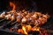 grilled skewered poultry pieces over burning embers