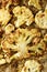 Grilled slices of cauliflower with parmesan cheese