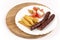 Grilled smoked homemade sausages with french fries