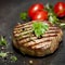 Grilled Steak with Herbs and Tomatoes