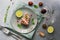 Grilled steak tuna with lime and red wine on a gray background. Top view, flat lay