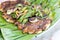 Grilled stingray fish fillet with spices Asian style