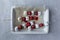 Grilled Strawberry and Marshmallow in baking dish on grey background