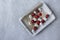 Grilled Strawberry and Marshmallow in baking dish on grey background. Copy space