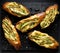 Grilled  toasts, bruschetta with addition of melted cheese, green asparagus, olive oil and herbs on a black background, top view.