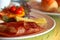 grilled tomato , bacon ,mushrooms,chees and salad on Table