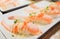 Grilled toro salmon sushi sake nigiri with shrimp eggs tobiko