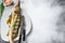 Grilled Zander, walleye fish with herbs and lemon on a plate. Gray wooden background. Top view. Copy space