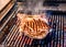 Grilling Big T-bone steak on natural charcoal barbecue grill.