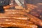 Grilling different kinds of sausages, dry and fresh meat on an open barbeque