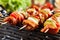 Grilling shashlik on barbecue grill