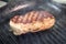 Grilling steak on a grill pan. Beef tender steak on the grill pan. Meat for steak.