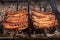 Grilling steaks on flaming grill and shot with selective focus