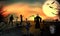 Grim reaper in graveyard standing on night full moon glow and Zombie in cemetery. Halloween horizontal background. Zombie hand