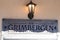 Grimbergen Belgian abbey beers sign text and logo on wall panel bar brand restaurant