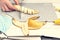 Grinding a banana on a cutting board made of artificial stone