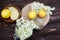 Grinding lemon and black elderberry on a cutting board to make an herbal drink or medicine for healing at home from