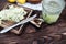 Grinding lemon and black elderberry on a cutting board to make an herbal drink or medicine for healing at home from