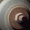 Grinding wheel. The rough surface of an old grinding wheel. Old industrial equipment