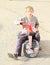 Grinning boy on motorbike