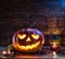 Grinning pumpkin lantern or jack-o\'-lantern is one of the symbol