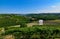 Grinzane Cavour, Piedmont, Italy. July 2018. At the foot of the castle all around heavenly views of the vineyards