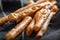 Grissini - traditional Italian salty breadsticks sprinkled with