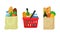 Grocery purchase set. Textile bag, shopping basket and paper package with products. Foods and drinks, vegetables and fruits.