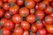 Grocery store showcase or supermarket shelf. Tomatoes