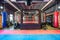 GRODNO, BELARUS - APRIL 2019: Hall of martial arts with fighting ring and punching bags in the modern Fight club