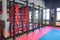 GRODNO, BELARUS - APRIL 2019: Hall of martial arts with fighting ring and punching bags in the modern Fight club