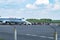 GRODNO, BELARUS - AUGUST 2019: crowd of tourists near the plane awaiting flight. Aircraft that await passengers