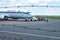 GRODNO, BELARUS - AUGUST 2019: crowd of tourists near the plane awaiting flight. Aircraft that await passengers