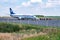 GRODNO, BELARUS - AUGUST 2019: crowd of tourists near the plane awaiting flight. Aircraft that await passengers