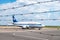 GRODNO, BELARUS - AUGUST 2019: plane awaiting flight behind the barbed wire. Aircraft that await passengers