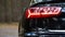 GRODNO, BELARUS - DECEMBER 2019: Audi A6 4G, C7 2016 Left back led modern rear light or taillight of black metallic car