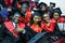 GRODNO, BELARUS - JUNE, 2018: Foreign african medical students in square academic graduation caps and black raincoats during