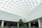 Grodno, Belarus May 20, 2021: Wide and spacious lobby on the top floor of the shopping center. Beautiful designer ceiling of