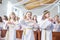 GRODNO, BELARUS - MAY 2019: Young children in the Catholic Church are waiting for the first eucharist communion. Little angels in